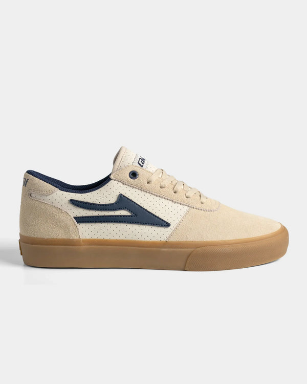 Lakai Manchester Elite skate shoe in Whisper White Suede Navy, side profile