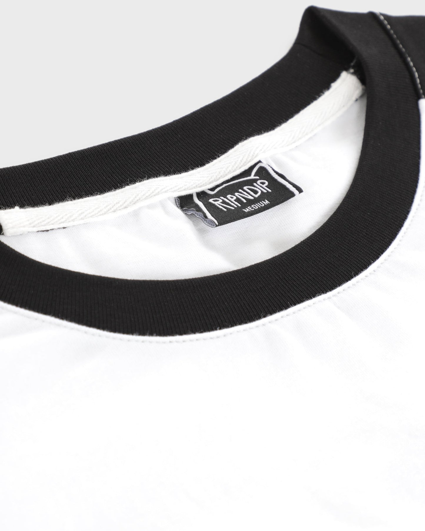 LAKAI x RIPNDIP - Raglan SS Tee - White Black