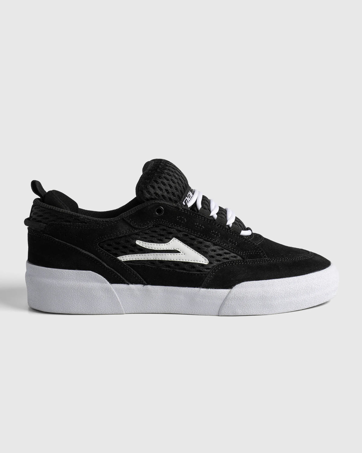 Lakai Aran skate shoe in Black Suede White, side profile