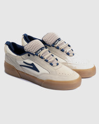 Lakai Aran skate shoes in Whisper White Suede, angled pair view