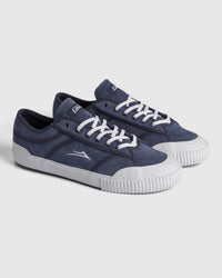 Lakai Conrad Elite skate shoes in Light Navy White, angled pair view