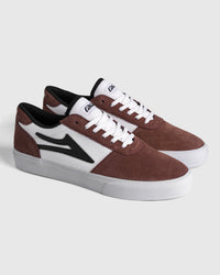 Lakai Manchester skate shoes in Dark Rose White Black, angled pair view