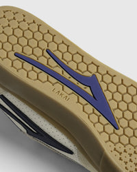 Lakai Manchester Elite skate shoe in Whisper White Suede Navy, heel and side detail