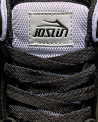 Skater wearing Lakai Telford Low Chris Joslin skate shoes in Black White