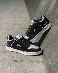 Skater wearing Lakai Telford Low Chris Joslin skate shoes in Black White
