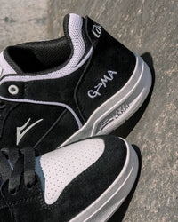 Skater wearing Lakai Telford Low Chris Joslin skate shoes in Black White